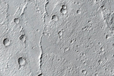 Zunil Crater Ray Formed within a Dusty Region
