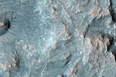 Deep Rocks Unveiled at Bonestell Crater