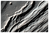 Intra-Crater Structure in NW Hellas Basin