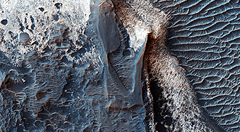 Deposits along the Northern Wall of Melas Chasma 