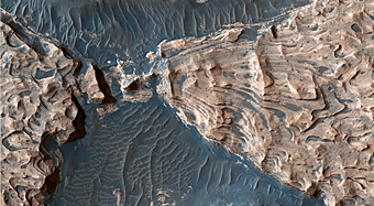 Uplifted Blocks of Light-Toned Layered Deposits