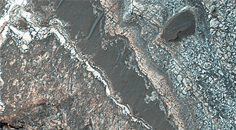 Layers along a Pit in Coprates Catena